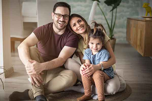 Parents with daughter at home