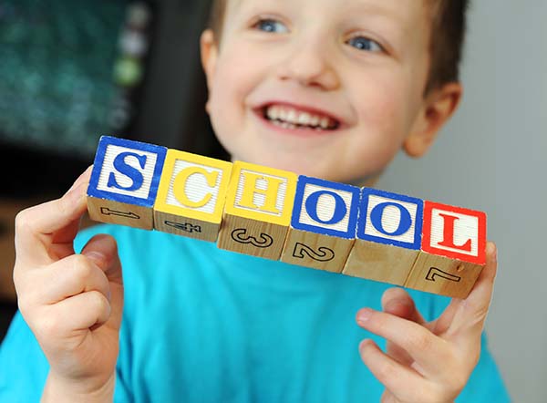 Child with School Blocks